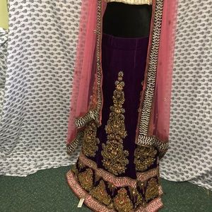 Heavy purple velvet lehenga with pink dupatta
